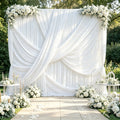 White Draped Fabric Backdrop Curtain With Crossed Swags